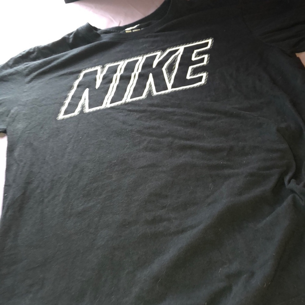 Black and white nike t-shirt. Size men’s medium.